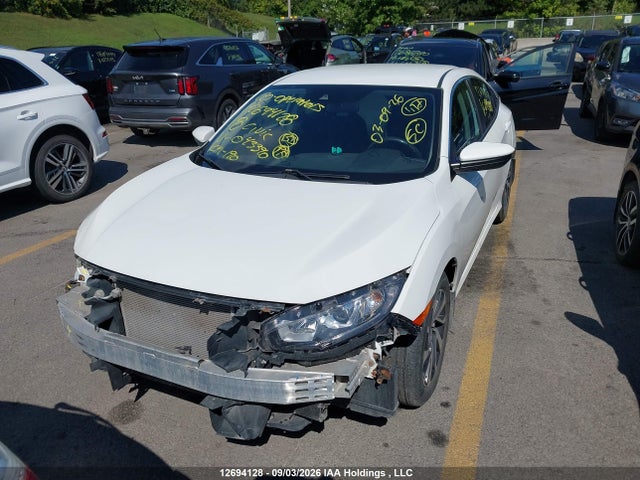 12694128 :رقم المزاد ، 2HGFC2F60JH043390 vin ، 2018 Honda Civic Lx مزاد بيع