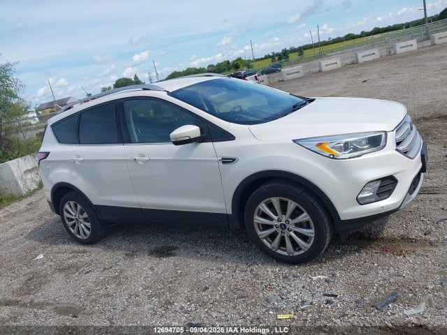 Продаж на аукціоні авто 2018 Ford Escape Titanium, vin: 1FMCU9J90JUB78192, номер лоту: 12694705