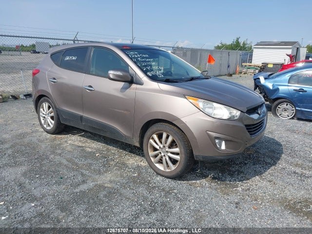 2011 Hyundai Tucson Limited მანქანა იყიდება აუქციონზე, vin: KM8JUCAC5BU224262, აუქციონის ნომერი: 12675707