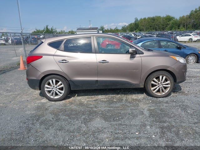 12675707 :رقم المزاد ، KM8JUCAC5BU224262 vin ، 2011 Hyundai Tucson Limited مزاد بيع