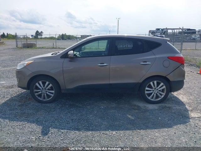 12675707 :رقم المزاد ، KM8JUCAC5BU224262 vin ، 2011 Hyundai Tucson Limited مزاد بيع