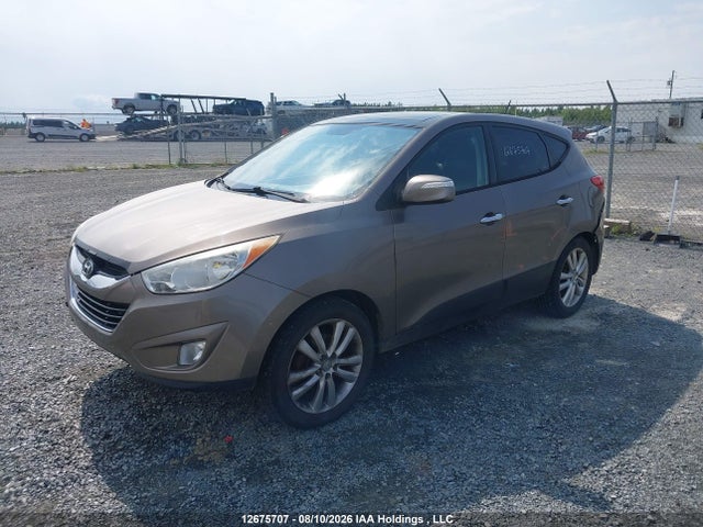 12675707 :رقم المزاد ، KM8JUCAC5BU224262 vin ، 2011 Hyundai Tucson Limited مزاد بيع