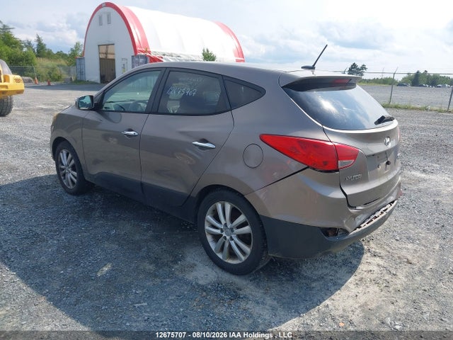 12675707 :رقم المزاد ، KM8JUCAC5BU224262 vin ، 2011 Hyundai Tucson Limited مزاد بيع