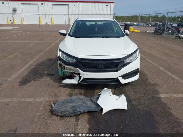 12695180 :رقم المزاد ، 2HGFC2F51GH015940 vin ، 2016 Honda Civic Lx مزاد بيع