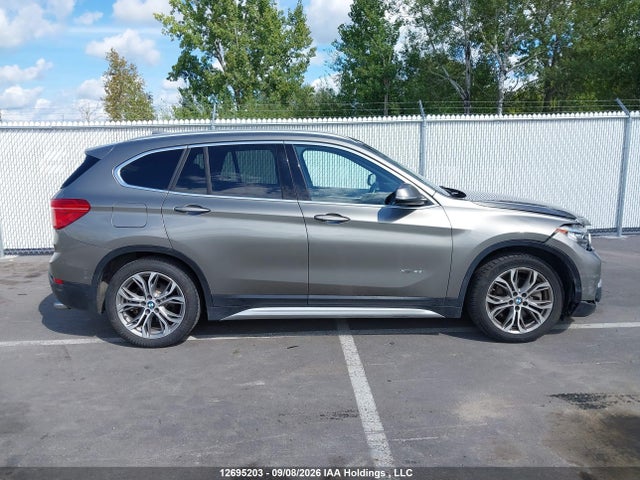 12695203 :رقم المزاد ، WBXHT3C35H5F81386 vin ، 2017 Bmw X1 Xdrive28i مزاد بيع