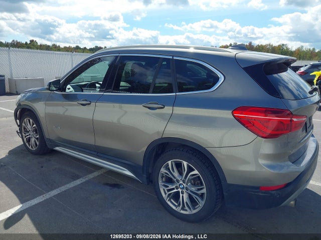 12695203 :رقم المزاد ، WBXHT3C35H5F81386 vin ، 2017 Bmw X1 Xdrive28i مزاد بيع