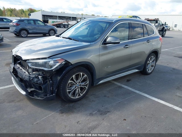 12695203 :رقم المزاد ، WBXHT3C35H5F81386 vin ، 2017 Bmw X1 Xdrive28i مزاد بيع
