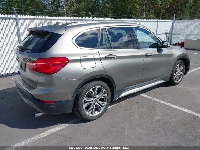 12695203 :رقم المزاد ، WBXHT3C35H5F81386 vin ، 2017 Bmw X1 Xdrive28i مزاد بيع
