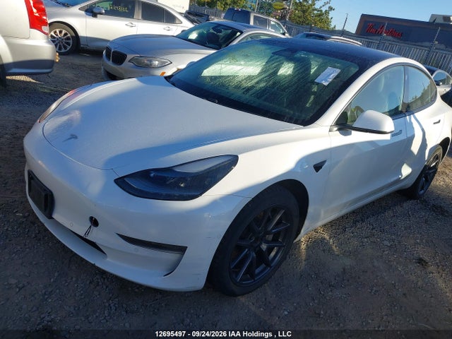 12695497 :رقم المزاد ، 5YJ3E1EA0MF963543 vin ، 2021 Tesla Model 3 مزاد بيع
