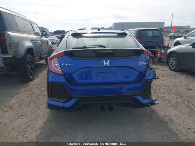 2019 Honda Civic Sport Touring მანქანა იყიდება აუქციონზე, vin: SHHFK7H94KU303477, აუქციონის ნომერი: 12695518