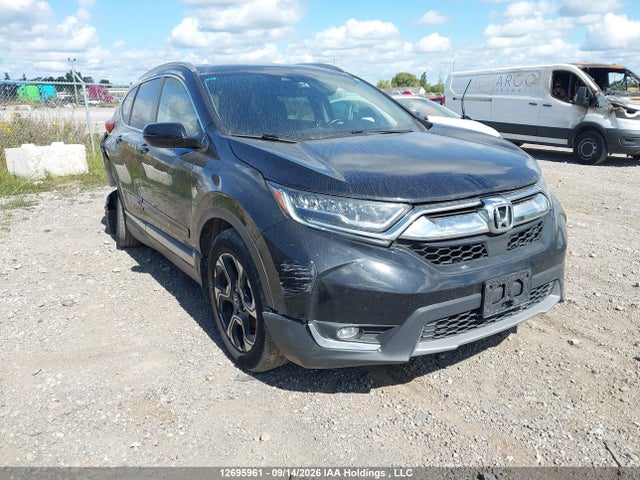 2019 Honda Cr-v Touring მანქანა იყიდება აუქციონზე, vin: 2HKRW2H97KH138936, აუქციონის ნომერი: 12695961