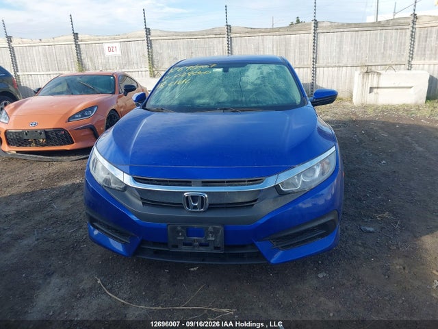 2HGFC2F54JH028060 Honda Civic Lx