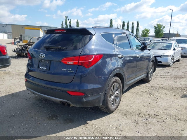 12696146 :رقم المزاد ، 5XYZUDLA8EG134960 vin ، 2014 Hyundai Santa Fe Sport 2.0t Premium مزاد بيع