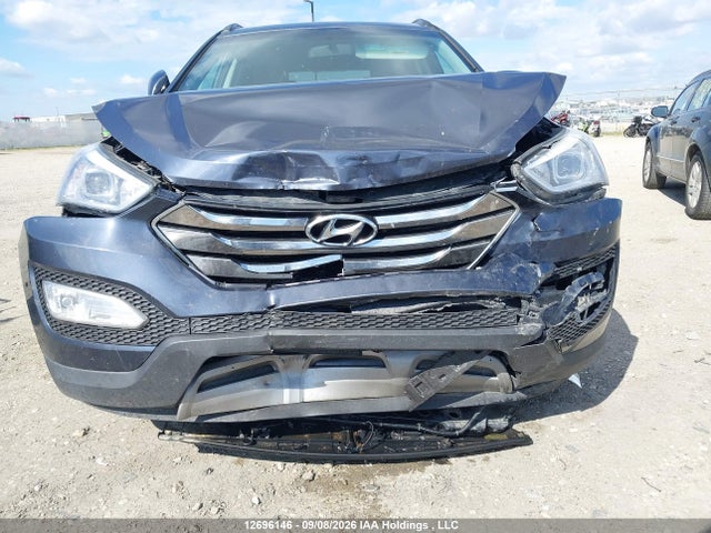 12696146 :رقم المزاد ، 5XYZUDLA8EG134960 vin ، 2014 Hyundai Santa Fe Sport 2.0t Premium مزاد بيع