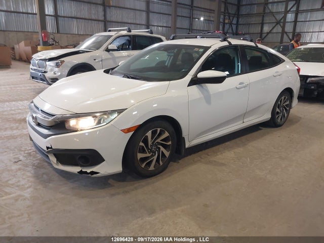 2HGFC2F65JH033325 Honda CIVIC SE