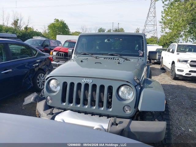 12696650 :رقم المزاد ، 1C4BJWEG7FL514983 vin ، 2015 Jeep Wrangler Unlimited Sahara مزاد بيع
