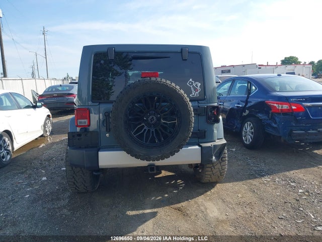 12696650 :رقم المزاد ، 1C4BJWEG7FL514983 vin ، 2015 Jeep Wrangler Unlimited Sahara مزاد بيع