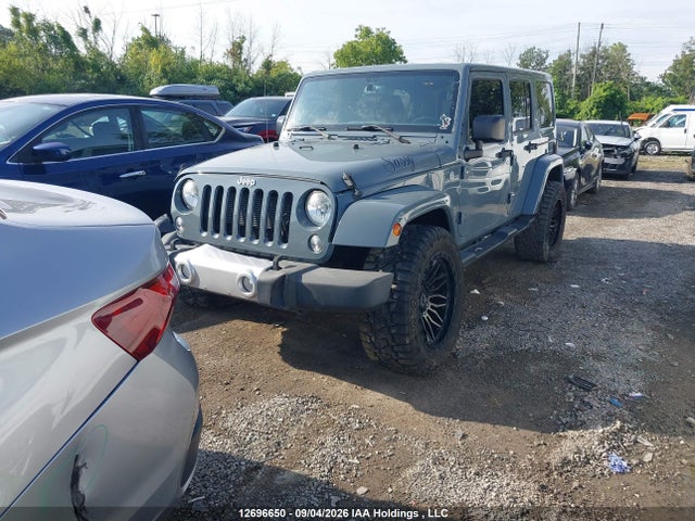 12696650 :رقم المزاد ، 1C4BJWEG7FL514983 vin ، 2015 Jeep Wrangler Unlimited Sahara مزاد بيع