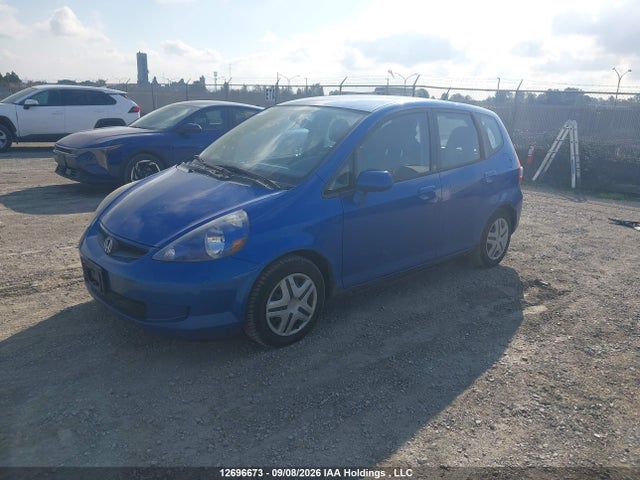 12696673 :رقم المزاد ، JHMGD38477S815403 vin ، 2007 Honda Fit مزاد بيع