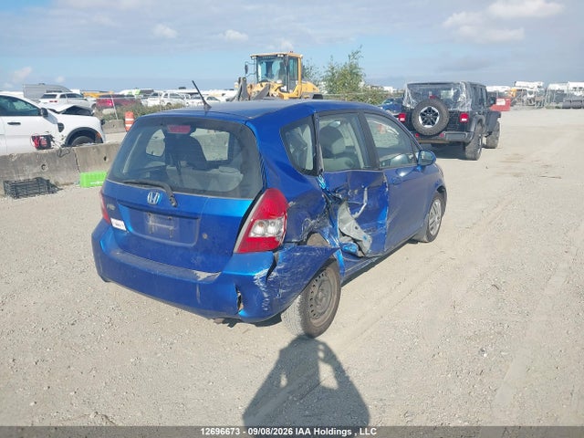 12696673 :رقم المزاد ، JHMGD38477S815403 vin ، 2007 Honda Fit مزاد بيع