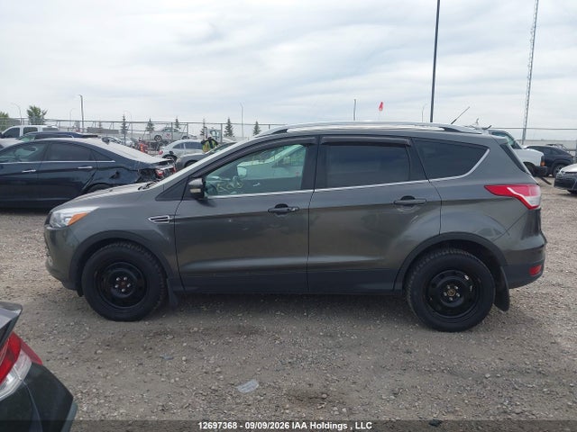 12697368 :رقم المزاد ، 1FMCU9J90FUC50967 vin ، 2015 Ford Escape Titanium مزاد بيع