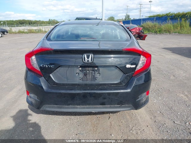 Honda Civic Dx 2018 2HGFC2E27JH035057 Image 16