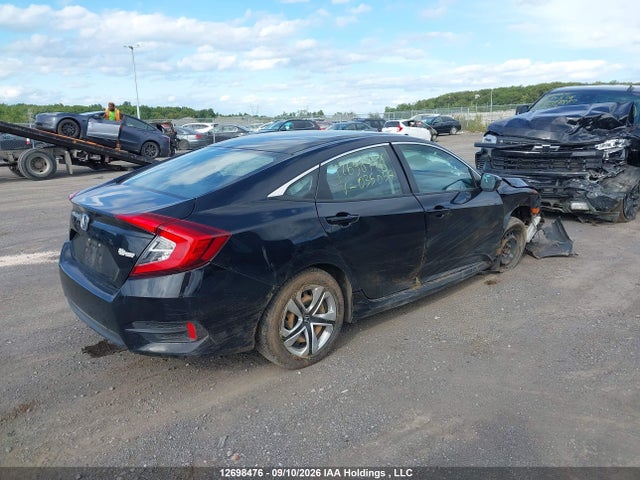 Honda Civic Dx 2018 2HGFC2E27JH035057 Image 4
