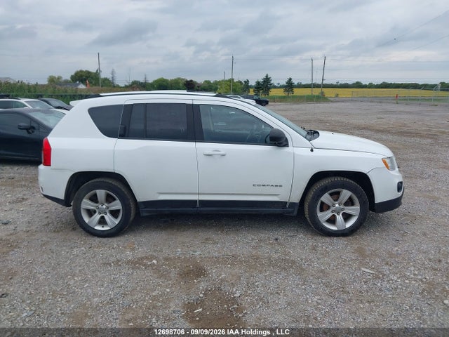 12698706 :رقم المزاد ، 1J4NF4FB7BD136197 vin ، 2011 Jeep Compass مزاد بيع
