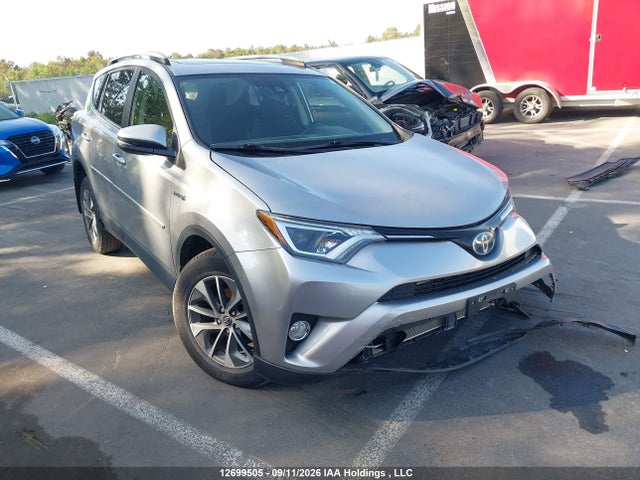 12699505 :رقم المزاد ، JTMRJREV6JD211808 vin ، 2018 Toyota Rav4 Hv Le Plus/xle مزاد بيع