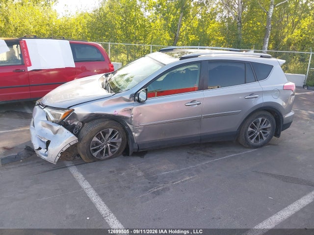 12699505 :رقم المزاد ، JTMRJREV6JD211808 vin ، 2018 Toyota Rav4 Hv Le Plus/xle مزاد بيع