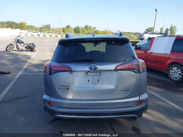 12699505 :رقم المزاد ، JTMRJREV6JD211808 vin ، 2018 Toyota Rav4 Hv Le Plus/xle مزاد بيع