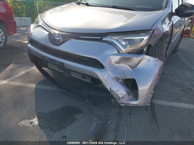 12699505 :رقم المزاد ، JTMRJREV6JD211808 vin ، 2018 Toyota Rav4 Hv Le Plus/xle مزاد بيع
