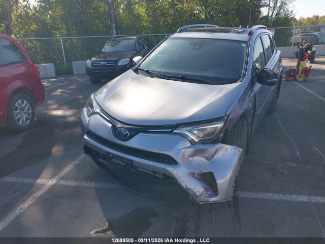 12699505 :رقم المزاد ، JTMRJREV6JD211808 vin ، 2018 Toyota Rav4 Hv Le Plus/xle مزاد بيع