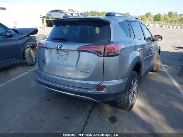 12699505 :رقم المزاد ، JTMRJREV6JD211808 vin ، 2018 Toyota Rav4 Hv Le Plus/xle مزاد بيع
