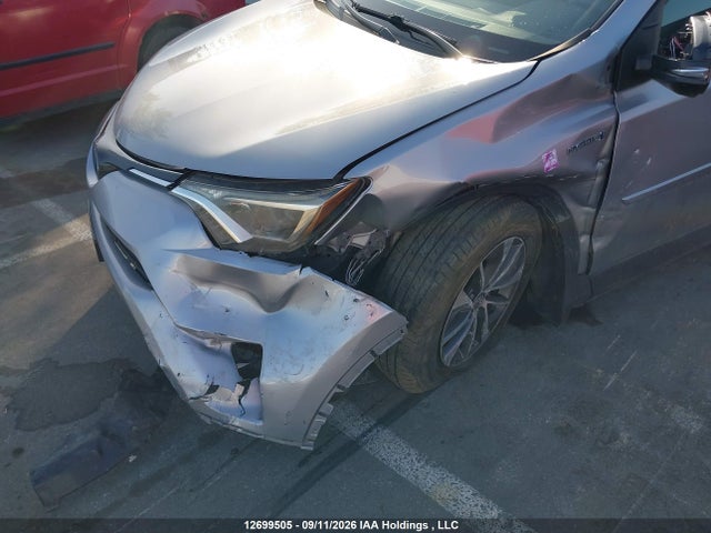 12699505 :رقم المزاد ، JTMRJREV6JD211808 vin ، 2018 Toyota Rav4 Hv Le Plus/xle مزاد بيع