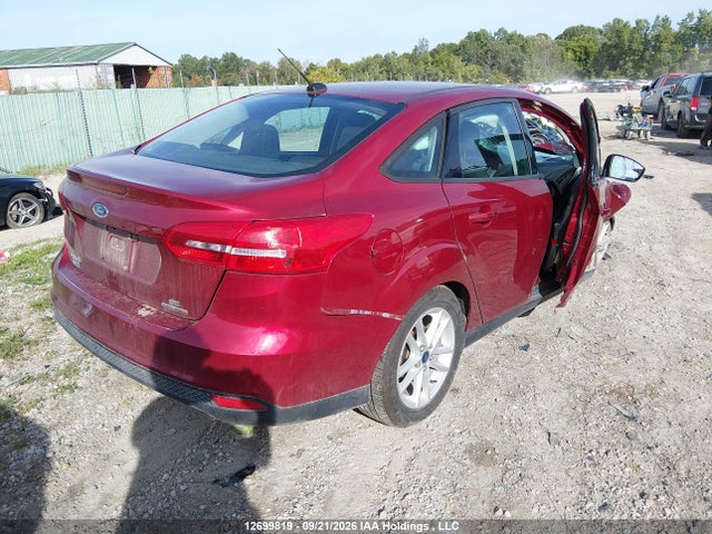 Auction sale of the 2015 Ford Focus, vin: 1FADP3F21FL258080, lot number: 12699819