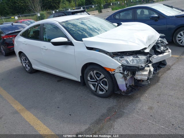 Продажа на аукционе авто 2018 Honda Civic Lx, vin: 2HGFC2F58JH032872, номер лота: 12700310