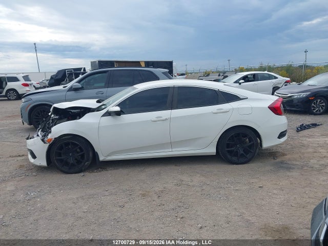 12700729 :رقم المزاد ، 2HGFC2F57HH034767 vin ، 2017 Honda Civic Lx مزاد بيع
