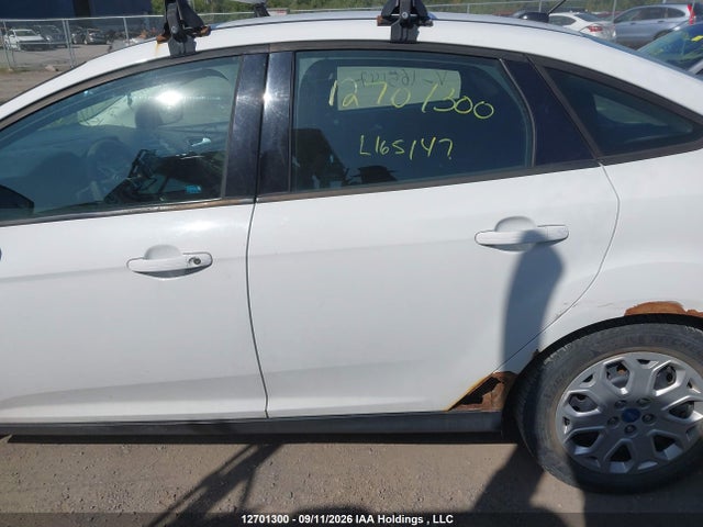 Продажа на аукционе авто 2012 Ford Focus Se, vin: 1FAHP3F26CL165147, номер лота: 12701300