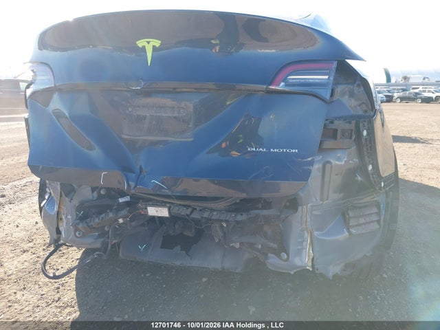 Tesla Model Y 2025 7SAYGDEEXSF293455 Image 6