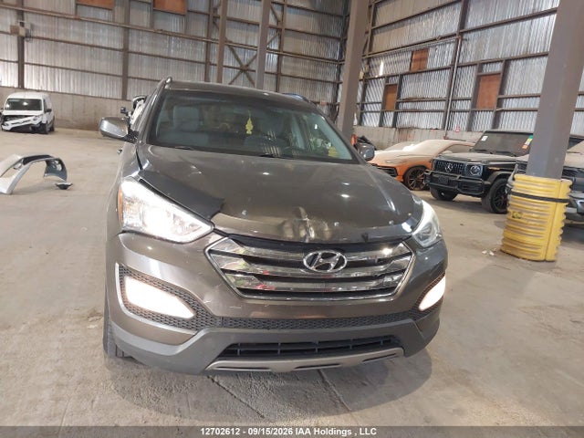 12702612 :رقم المزاد ، 5XYZT3LB7EG173304 vin ، 2014 Hyundai Santa Fe Sport مزاد بيع