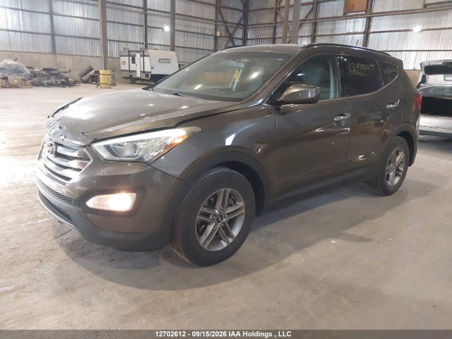12702612 :رقم المزاد ، 5XYZT3LB7EG173304 vin ، 2014 Hyundai Santa Fe Sport مزاد بيع