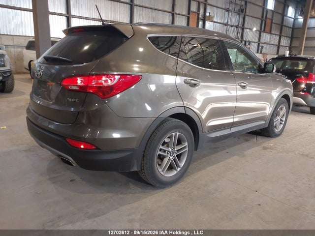 12702612 :رقم المزاد ، 5XYZT3LB7EG173304 vin ، 2014 Hyundai Santa Fe Sport مزاد بيع