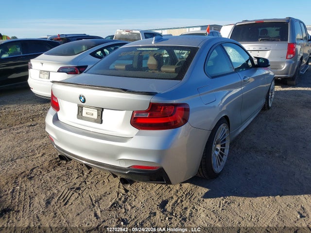 12702942 :رقم المزاد ، WBA1F5C50EVW98074 vin ، 2014 Bmw 228i مزاد بيع