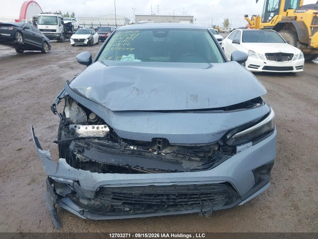 Продажа на аукционе авто 2022 Honda Civic Touring, vin: 2HGFE1F97NH002422, номер лота: 12703271