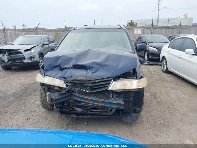 2004 Honda Odyssey Ex-l მანქანა იყიდება აუქციონზე, vin: 2HKRL18964H003713, აუქციონის ნომერი: 12703502