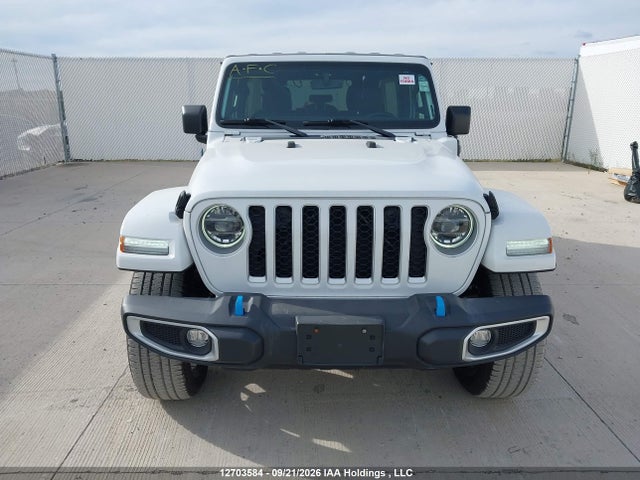 12703584 :رقم المزاد ، 1C4JJXP60NW147203 vin ، 2022 Jeep Wrangler Unlimited Sahara 4xe مزاد بيع