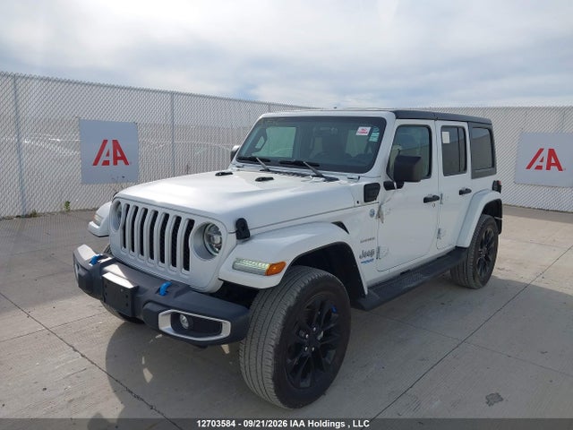 12703584 :رقم المزاد ، 1C4JJXP60NW147203 vin ، 2022 Jeep Wrangler Unlimited Sahara 4xe مزاد بيع