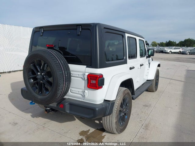 12703584 :رقم المزاد ، 1C4JJXP60NW147203 vin ، 2022 Jeep Wrangler Unlimited Sahara 4xe مزاد بيع