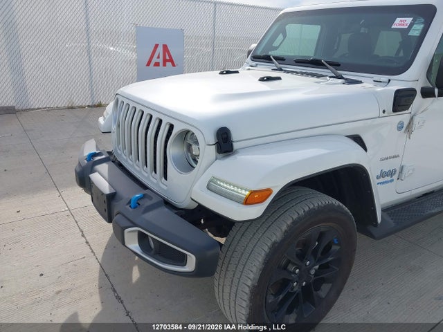 12703584 :رقم المزاد ، 1C4JJXP60NW147203 vin ، 2022 Jeep Wrangler Unlimited Sahara 4xe مزاد بيع
